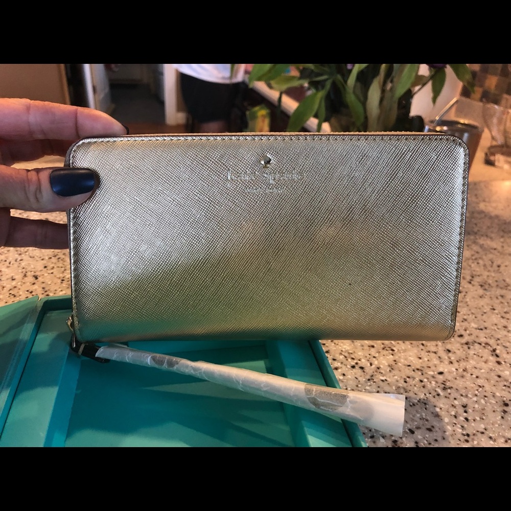 Gorgeous Gold Kate Spade phone wristlet